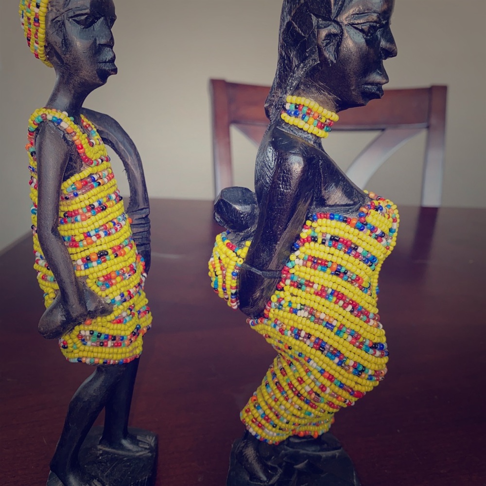 Hand crafted African couple carving.